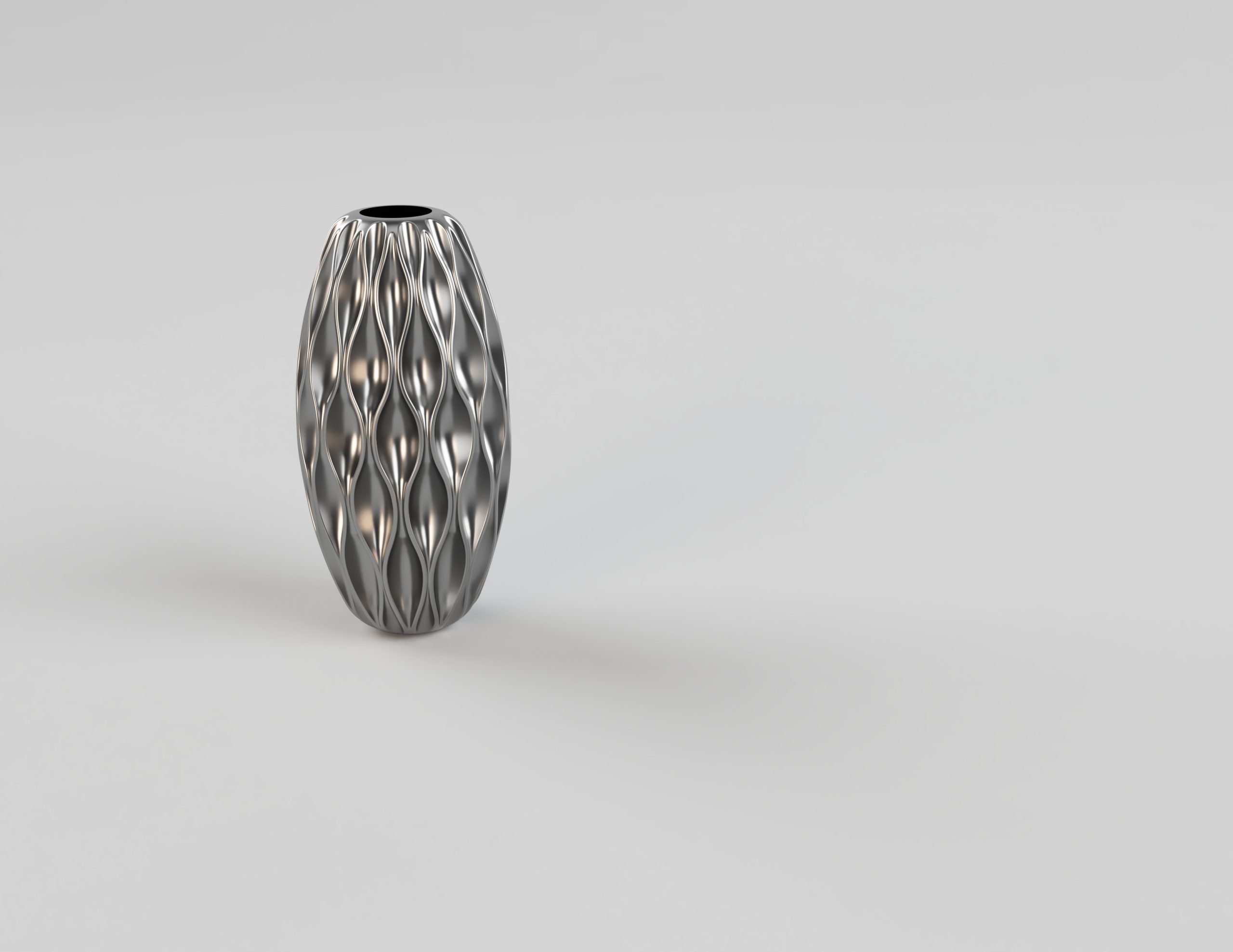 Lewis designs vases to test 3D printing in metal to the max